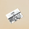 Product packaging with 'LAND' branding on a beige background